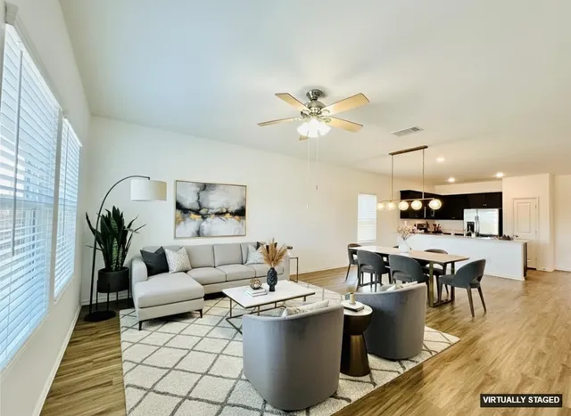 a kitchen with stainless steel appliances granite countertop a stove and a microwave