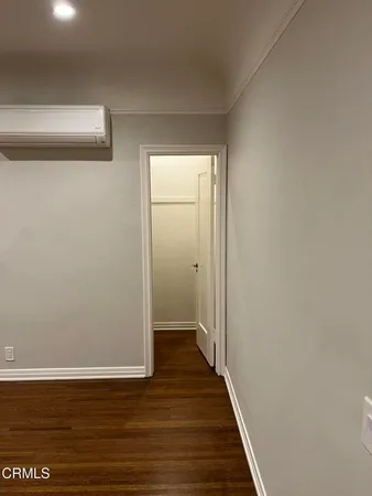 a view of a livingroom with wooden floor