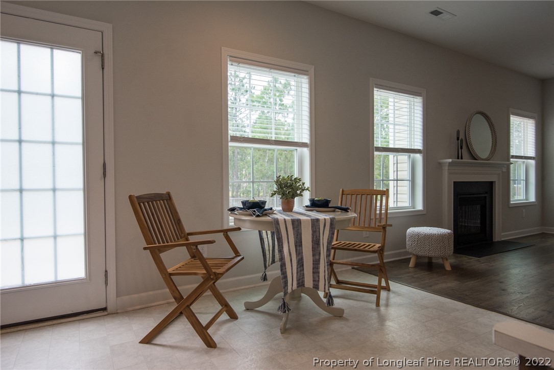 4095 Irwin Drive Aberdeen, NC 28315 - Photo 22 of 50 a view of a livingroom with furniture and a fireplace