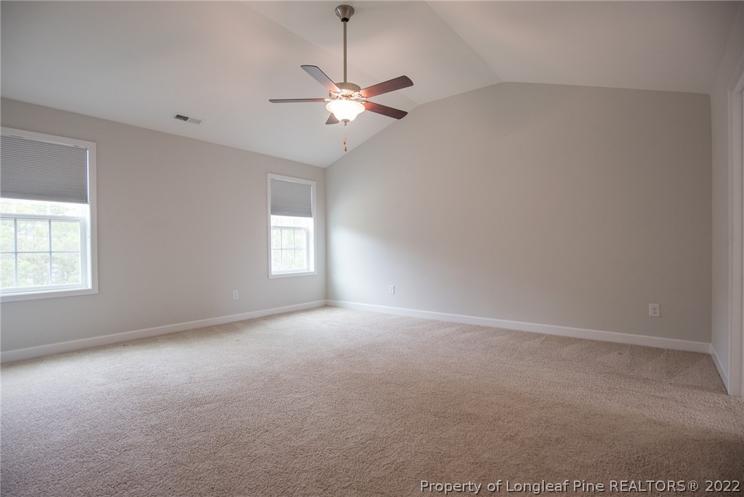 4095 Irwin Drive Aberdeen, NC 28315 - Photo 30 of 50 an empty room with windows and fan