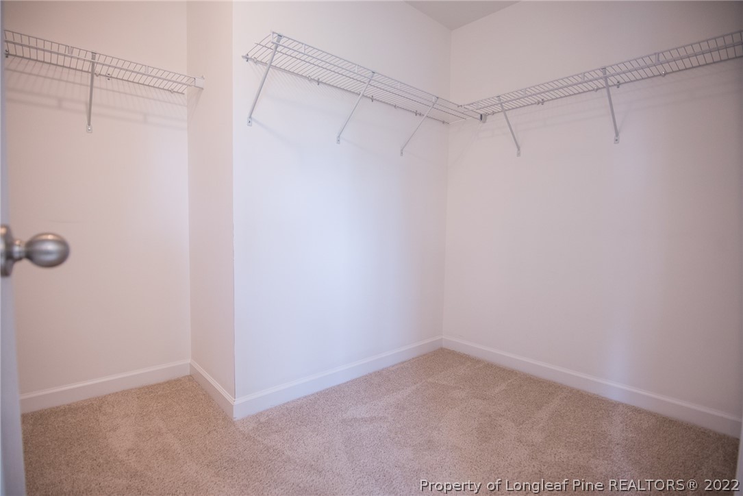 4095 Irwin Drive Aberdeen, NC 28315 - Photo 36 of 50 a view of a room with racks on the wall