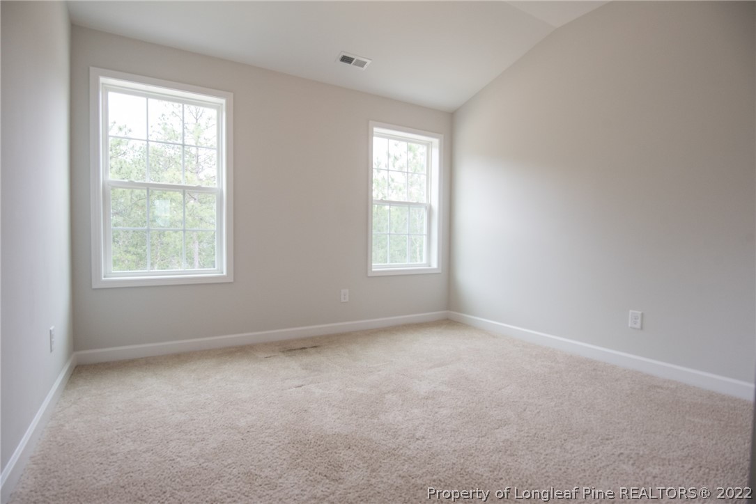 4095 Irwin Drive Aberdeen, NC 28315 - Photo 42 of 50 an empty room with windows