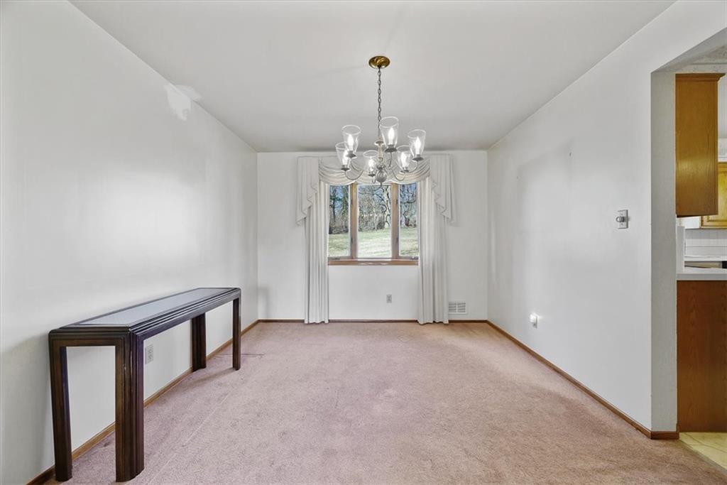 36 Diebold Road McKees Rocks, PA 15136 - Photo 5 of 20 a view of an empty room with chandelier and window