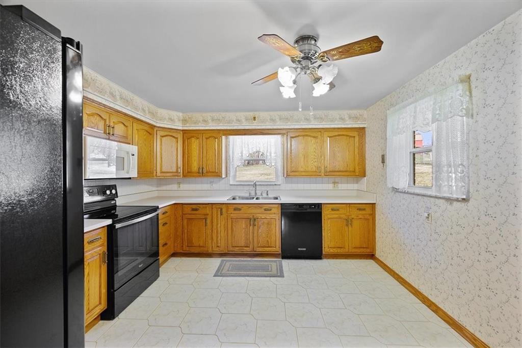 36 Diebold Road McKees Rocks, PA 15136 - Photo 6 of 20 a kitchen with a counter top space and stainless steel appliances