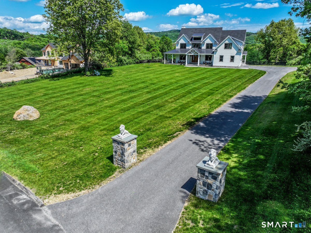 2 Pond View Lane Sherman, CT 06784 - Photo 1 of 40 a house view with a garden space