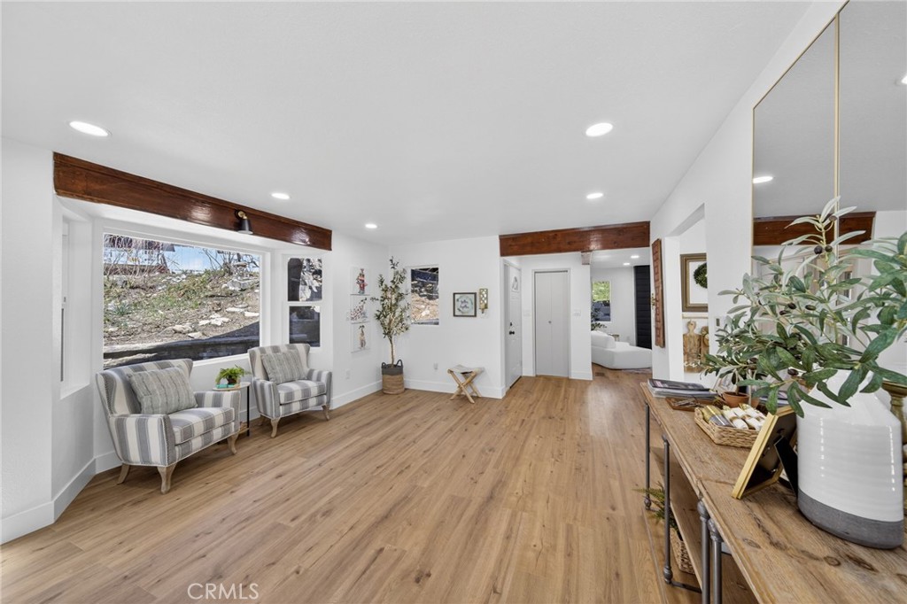 1171 Bear Springs Road Rimforest, CA 92378 - Photo 13 of 43 a living room with furniture and a flat screen tv