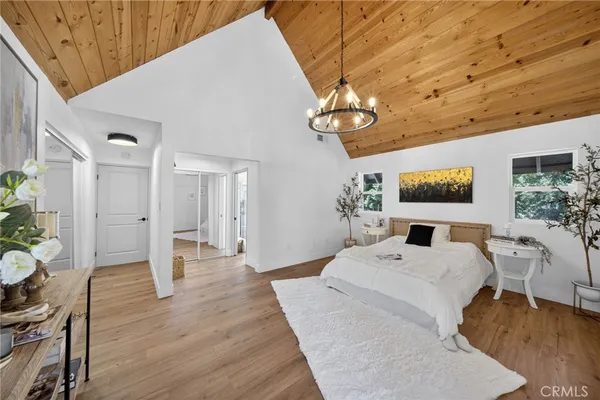 a view of a room with painting on the wall