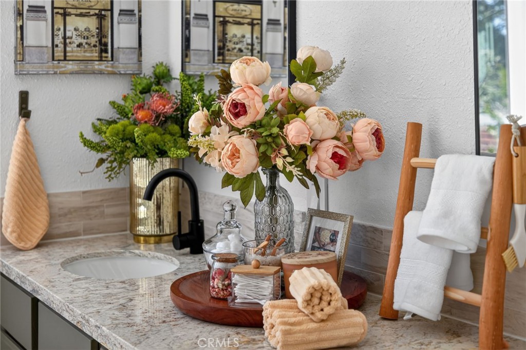 1171 Bear Springs Road Rimforest, CA 92378 - Photo 26 of 43 a vase of flowers sitting on a table