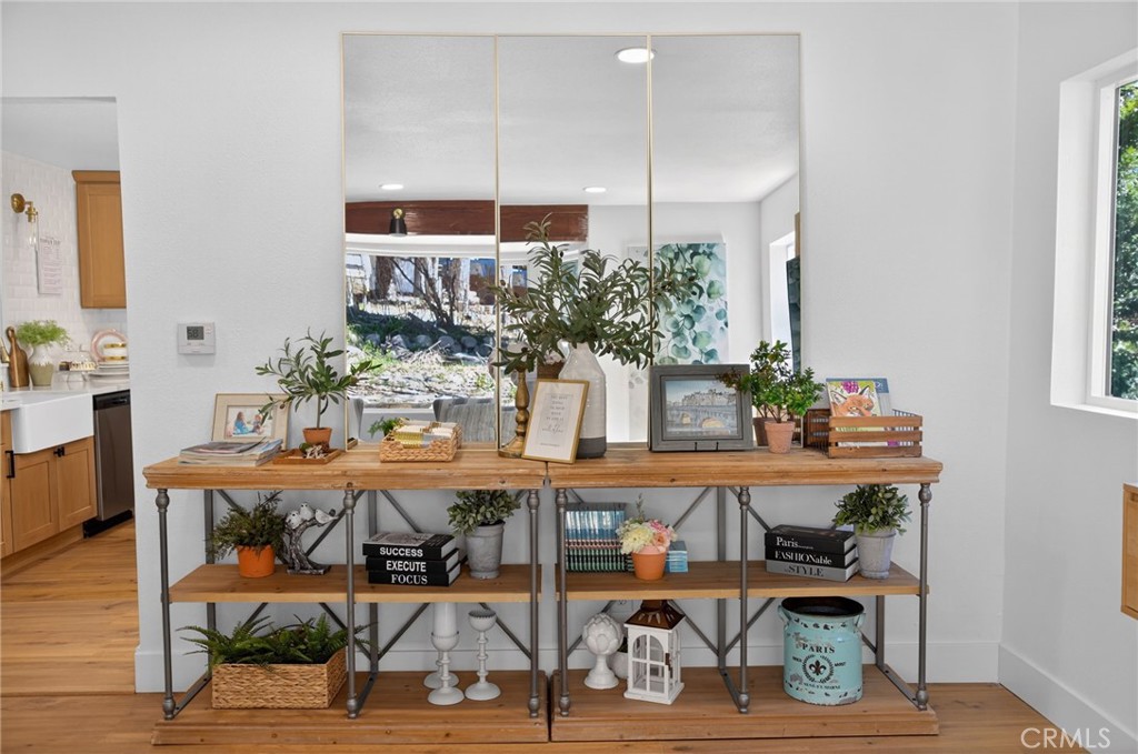 1171 Bear Springs Road Rimforest, CA 92378 - Photo 4 of 43 a view of a dining room with furniture and wooden floor