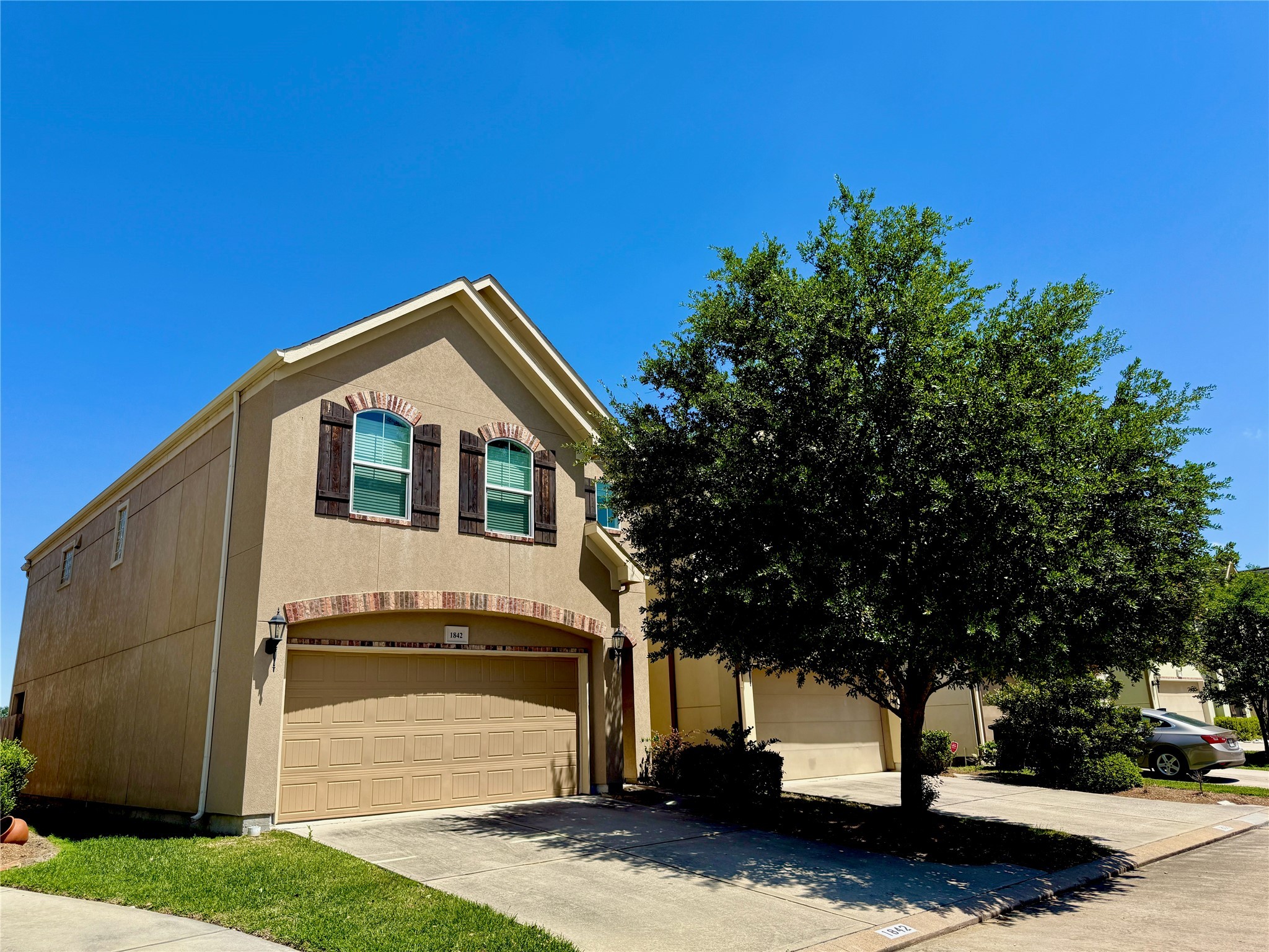 a house view with a garden space