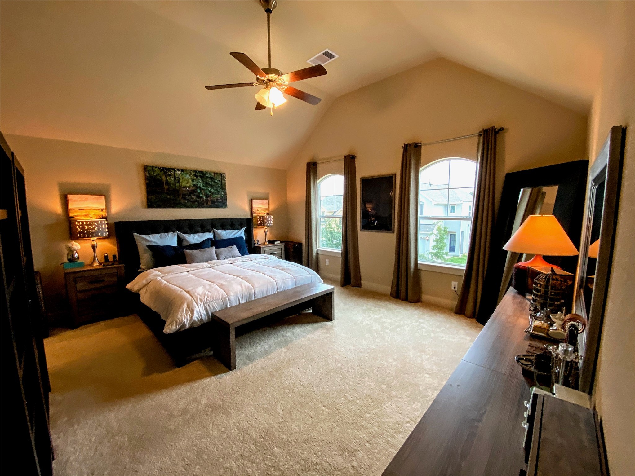1842 Jara Court Spring, TX 77388 - Photo 11 of 31 a bedroom with a bed and a flat tv screen on dresser
