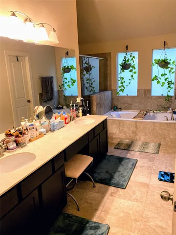 a kitchen with a sink and a stove