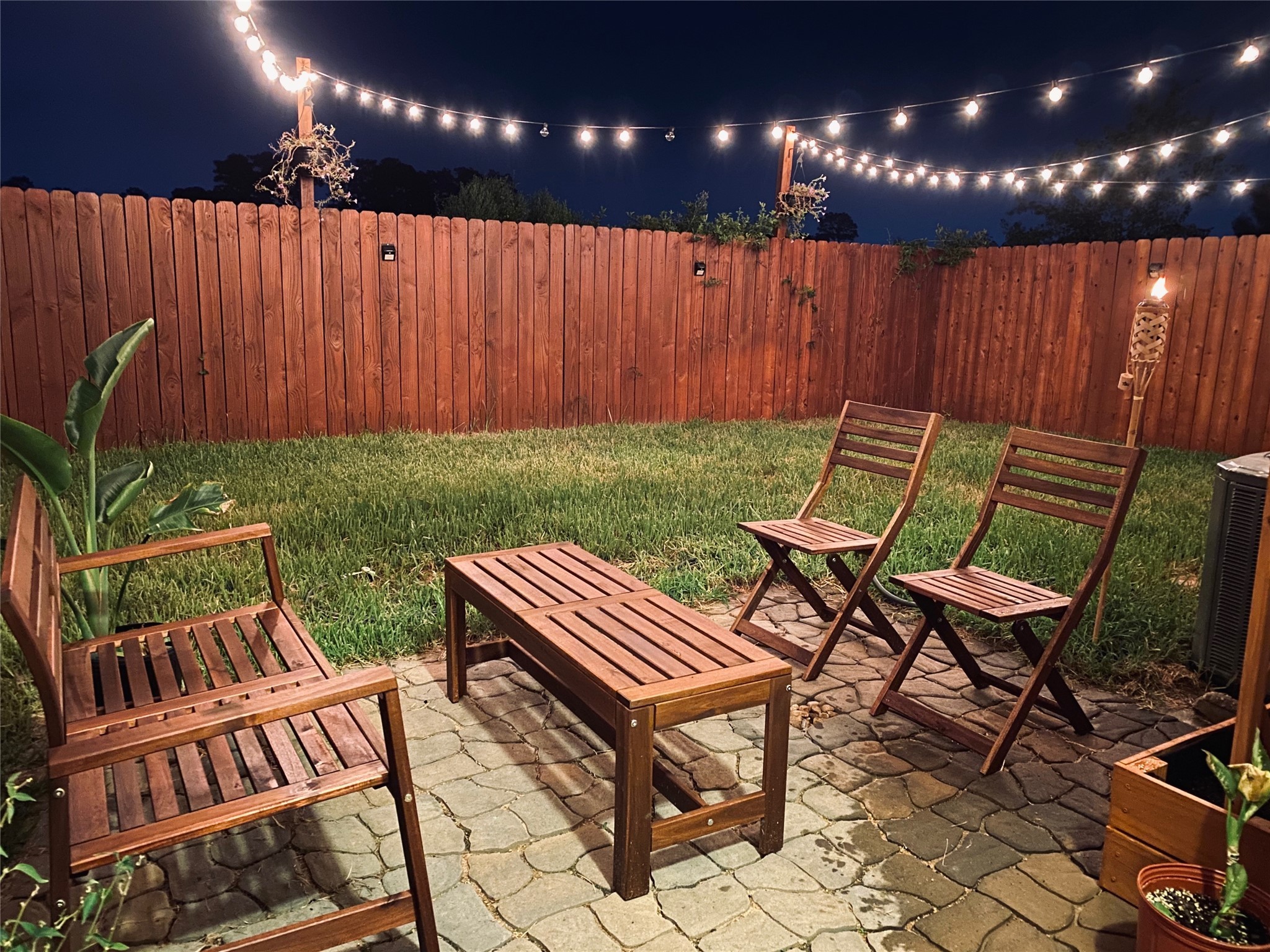1842 Jara Court Spring, TX 77388 - Photo 16 of 31 a backyard of a house with garden and outdoor seating