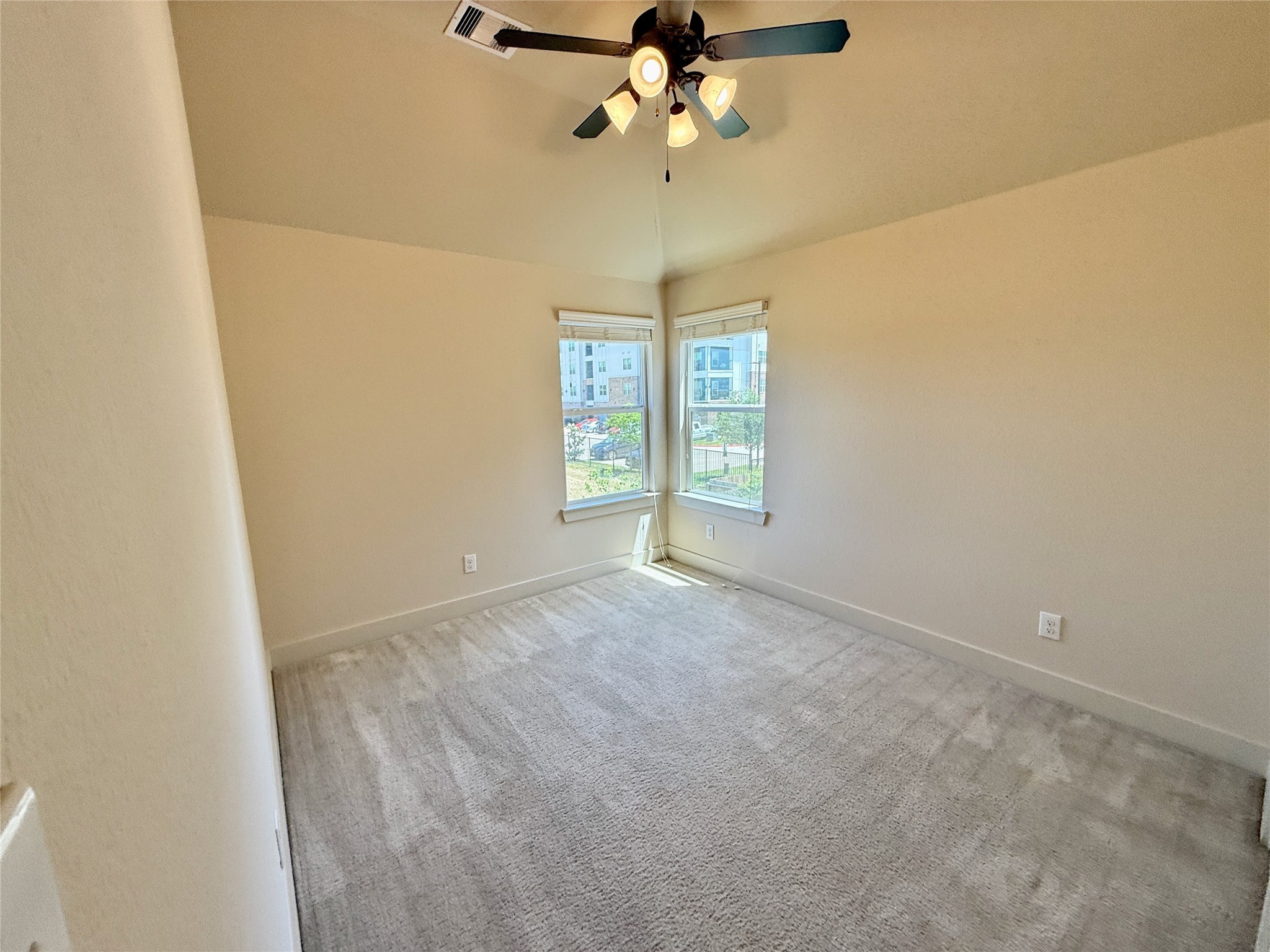 1842 Jara Court Spring, TX 77388 - Photo 30 of 31 an empty room with windows and fan