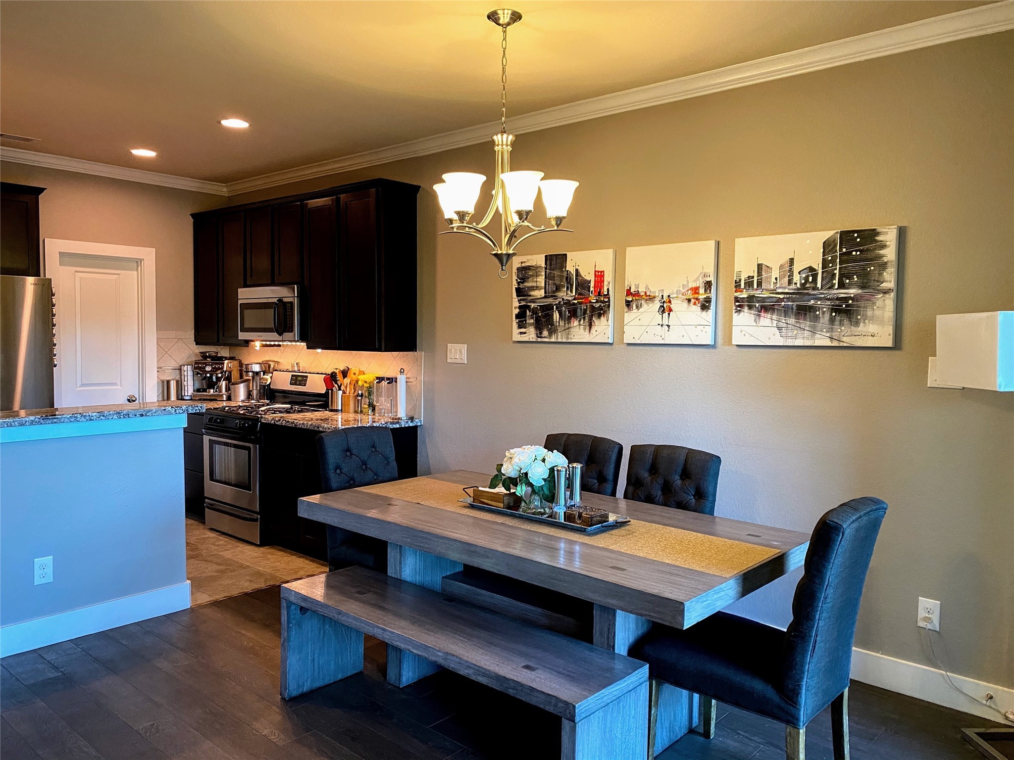 1842 Jara Court Spring, TX 77388 - Photo 5 of 31 a outdoor dining room with furniture and chandelier