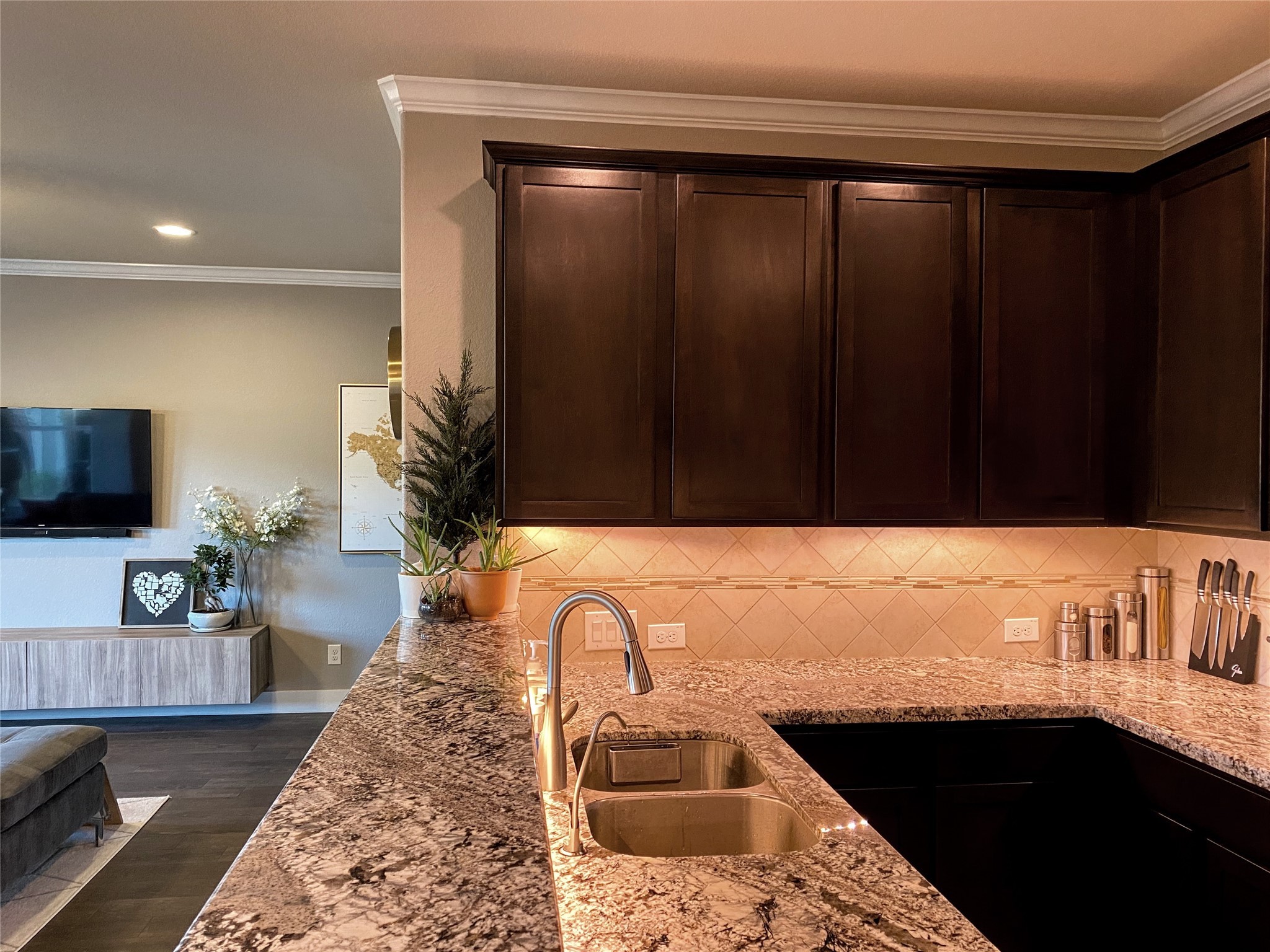 1842 Jara Court Spring, TX 77388 - Photo 8 of 31 a kitchen with a sink a refrigerator and a microwave