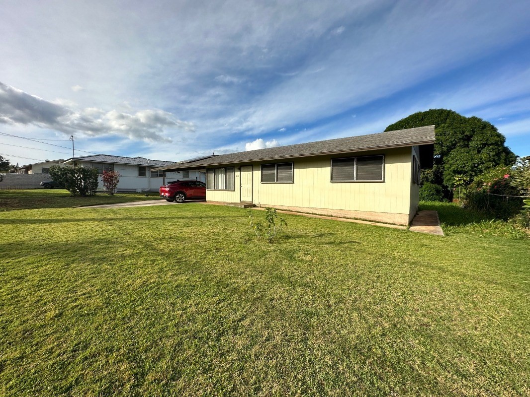 4850 Yamanoha Road Kapaa, HI 96746 - Photo 1 of 22 a view of a house with a yard