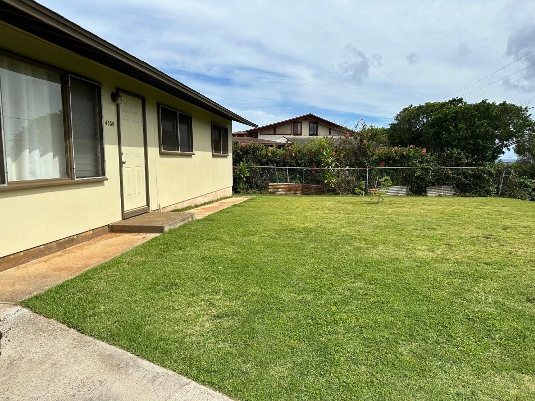 4850 Yamanoha Road Kapaa, HI 96746 - Photo 3 of 22 a house with garden in front of it