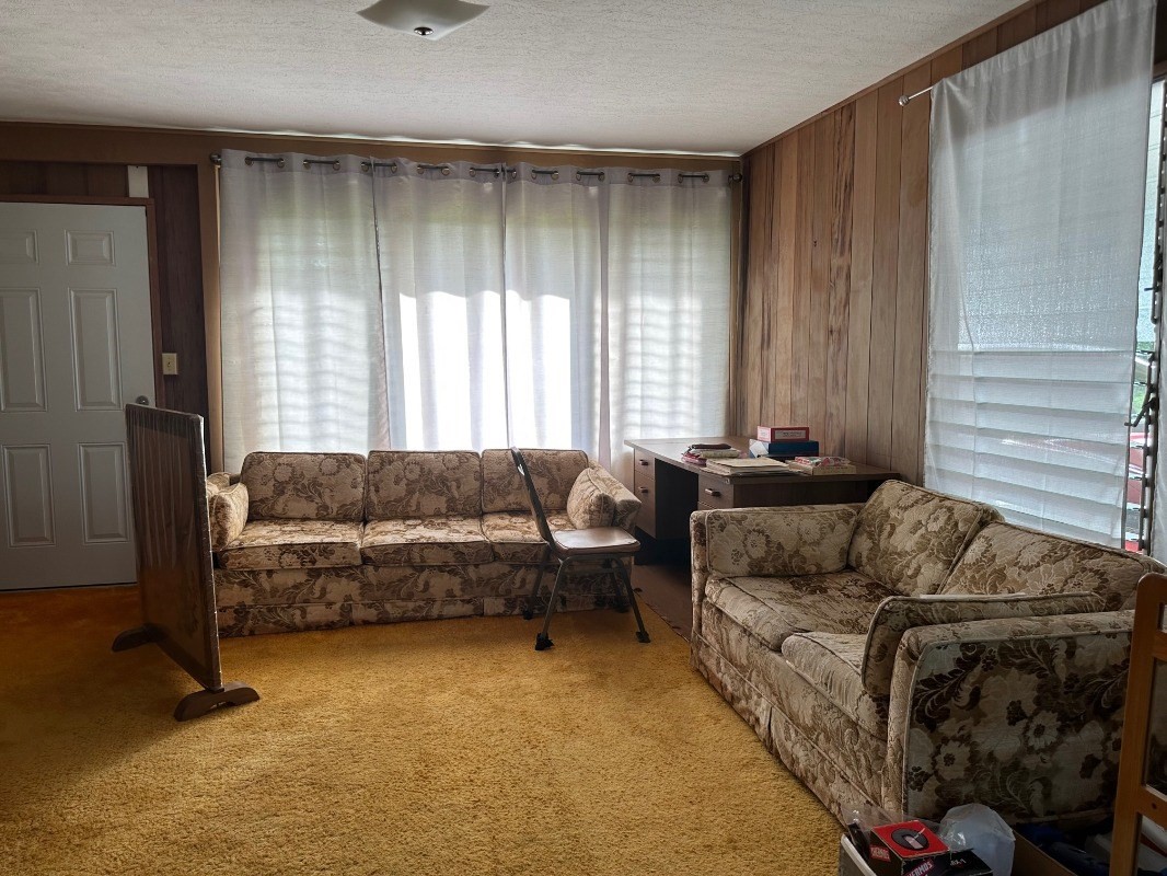 4850 Yamanoha Road Kapaa, HI 96746 - Photo 5 of 22 a living room with furniture and a window