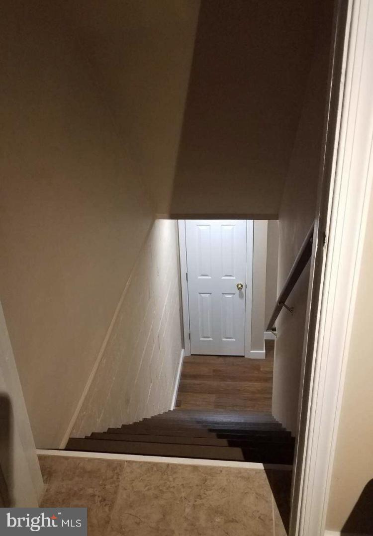 3701 Greenvale Road Baltimore, MD 21229 - Photo 16 of 22 Connecting staircase to basement