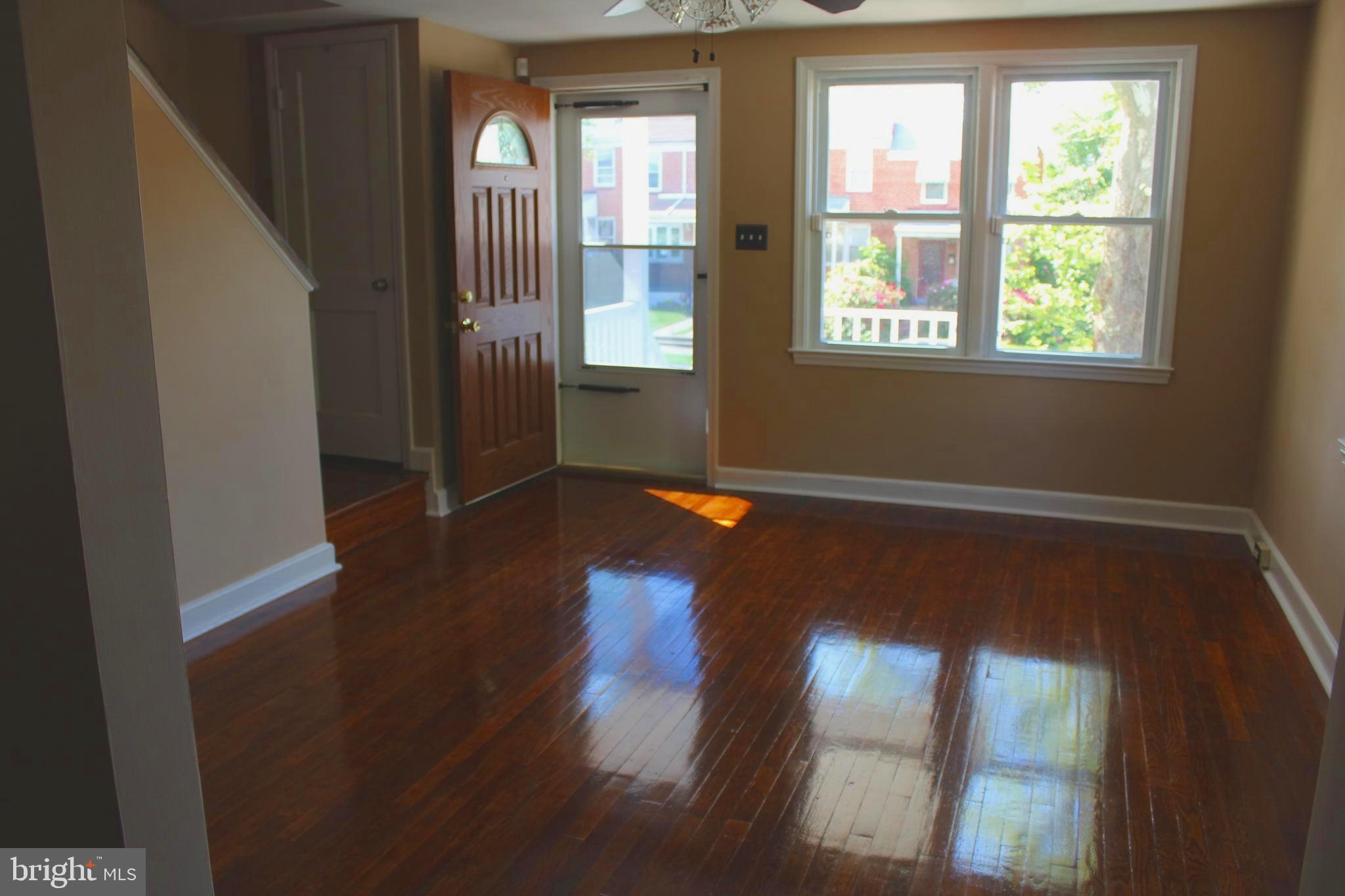 Gleaming hardwood floors throughout