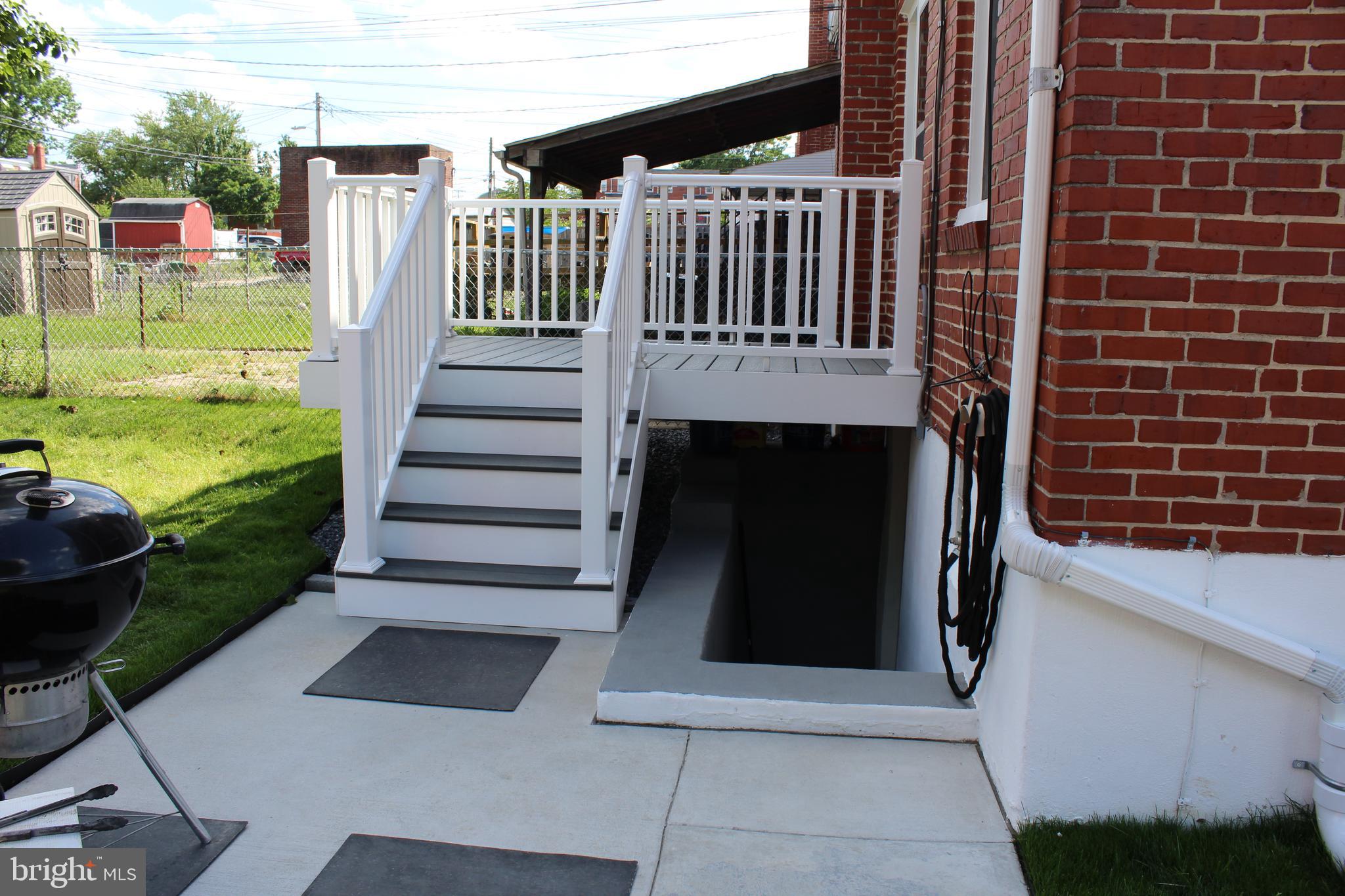 3701 Greenvale Road Baltimore, MD 21229 - Photo 9 of 22 New deck off of kitchen