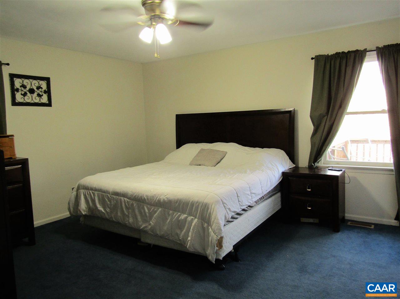 5 East Point Road Palmyra, VA 22963 - Photo 15 of 20 a bedroom with a bed and window