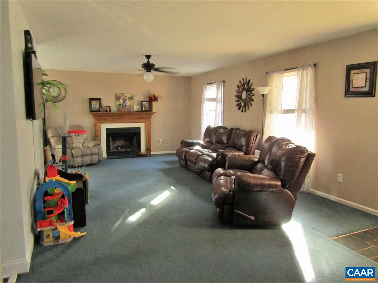 5 East Point Road Palmyra, VA 22963 - Photo 3 of 20 a living room with furniture and a fireplace