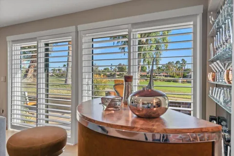 a view of a living room and dining room