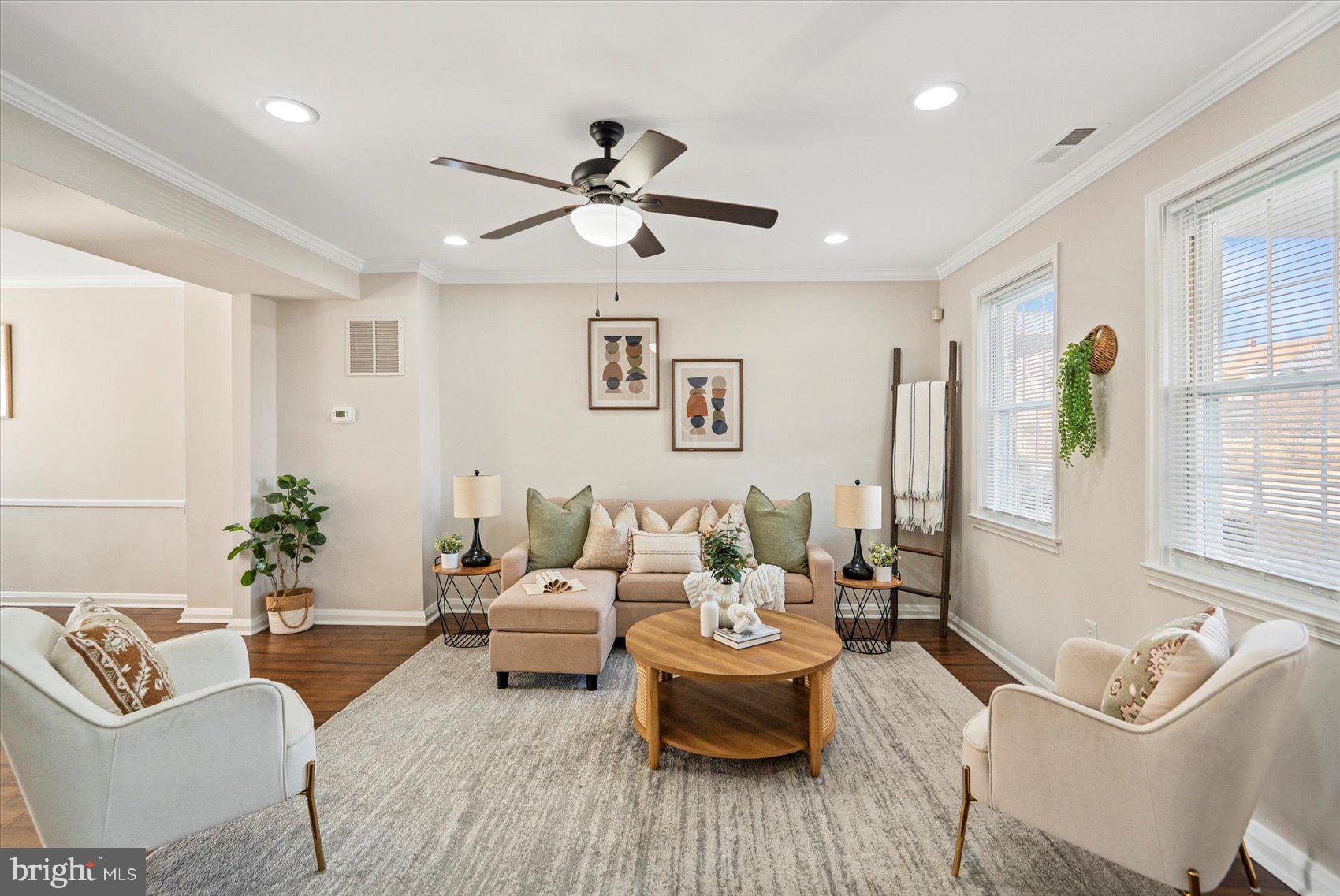 1283 Cedarcroft Road Baltimore, MD 21239 - Photo 18 of 39 a living room with furniture and a large window