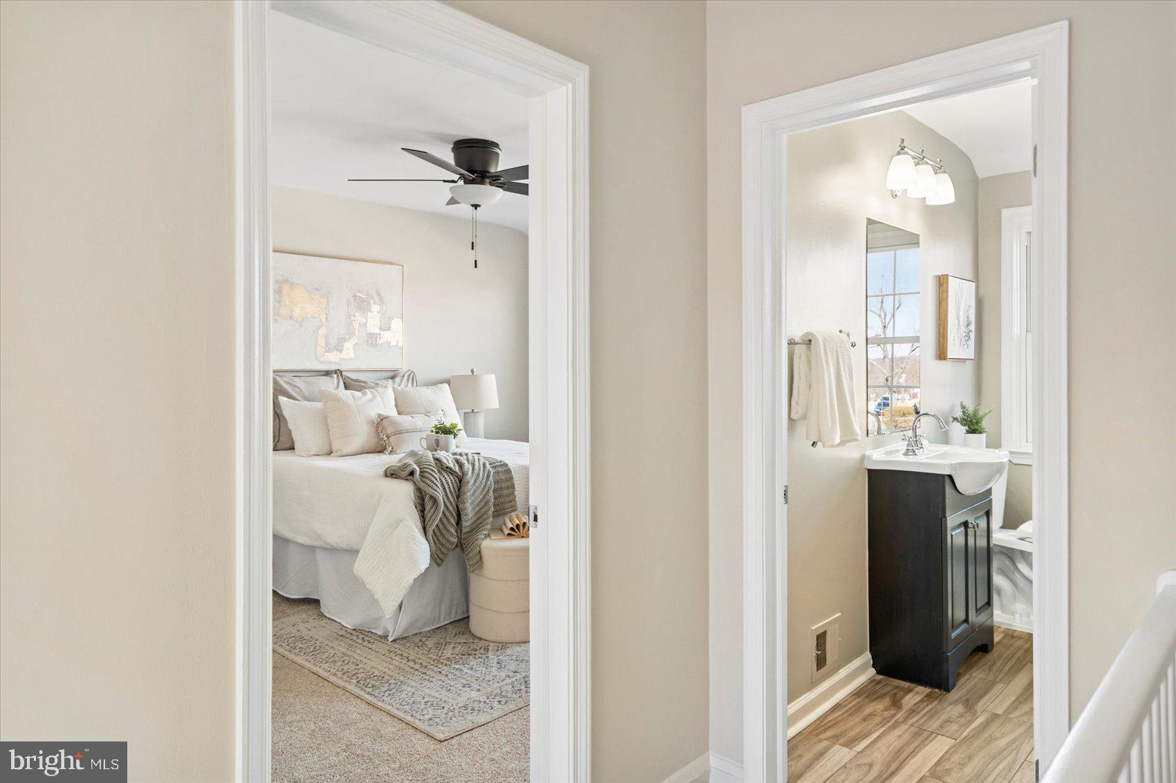 1283 Cedarcroft Road Baltimore, MD 21239 - Photo 19 of 39 a view of a bathroom with a tub and shower