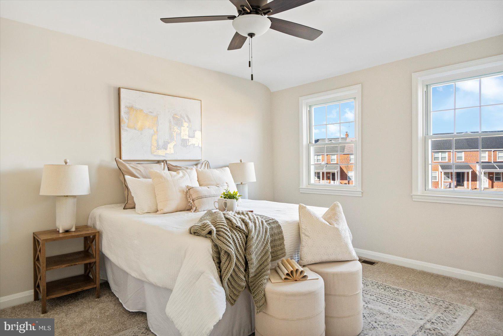 1283 Cedarcroft Road Baltimore, MD 21239 - Photo 20 of 39 a bedroom with a bed and a window