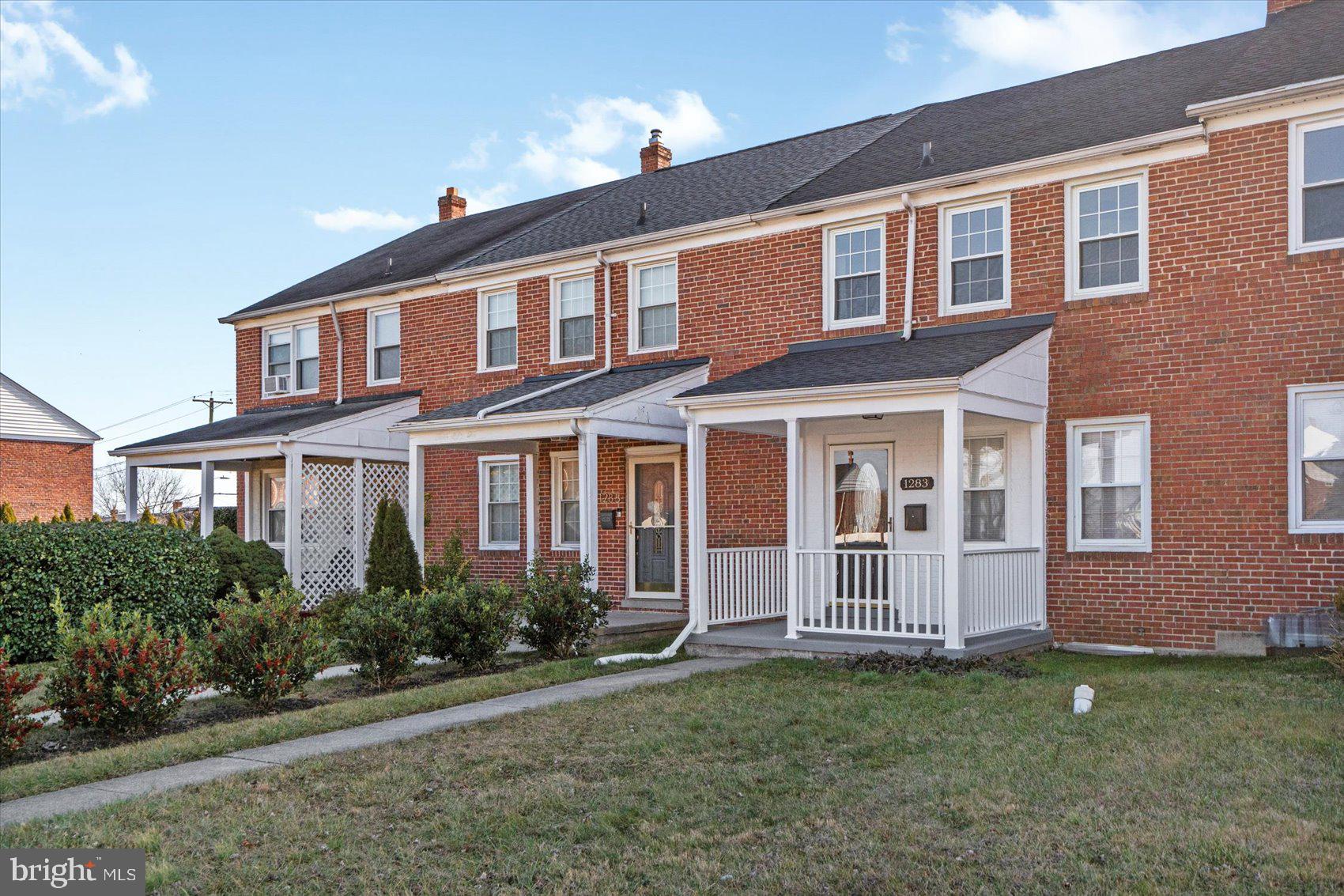 1283 Cedarcroft Road Baltimore, MD 21239 - Photo 39 of 39 a front view of a house with garden