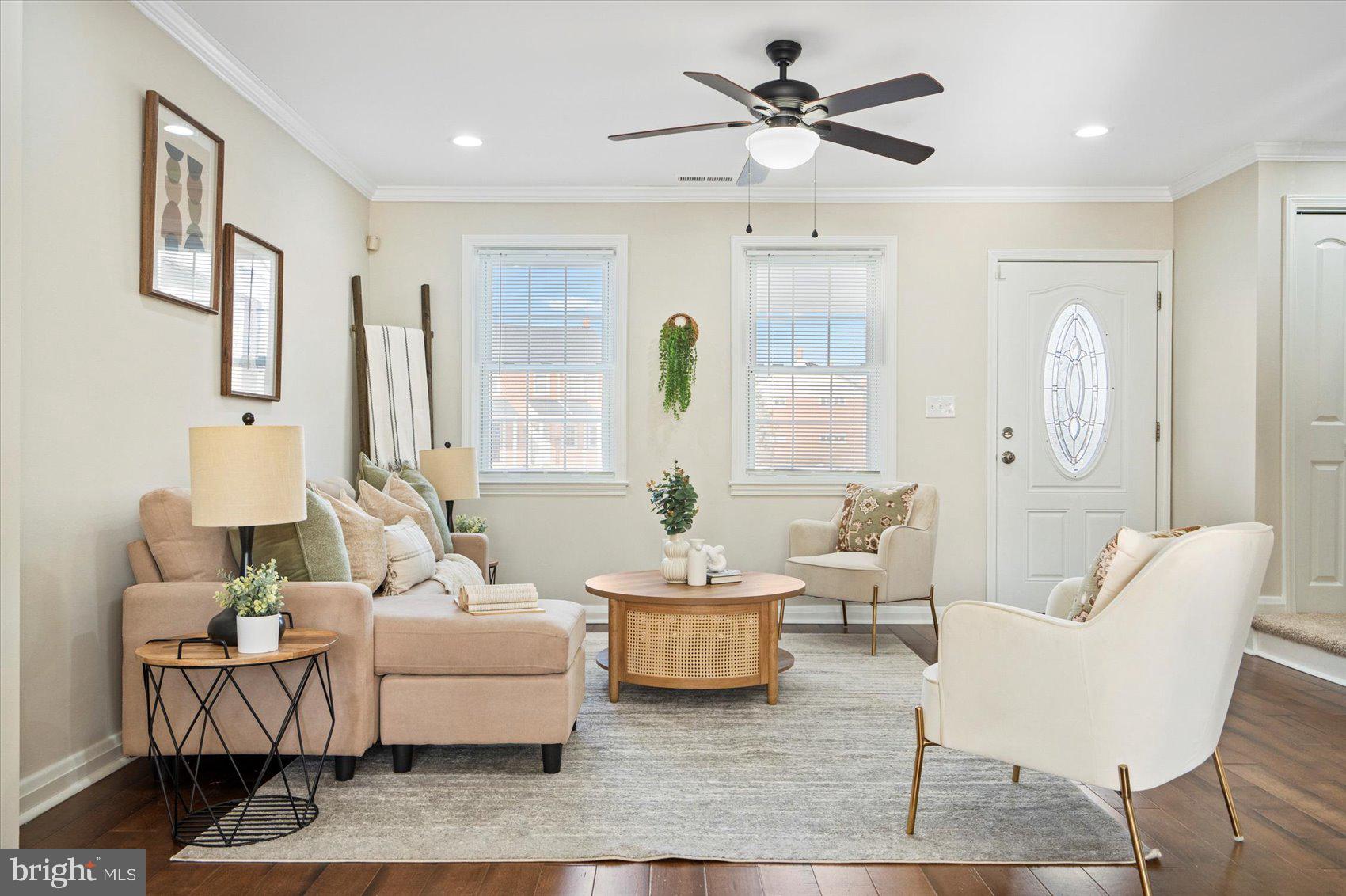 1283 Cedarcroft Road Baltimore, MD 21239 - Photo 7 of 39 a living room with furniture and a large window