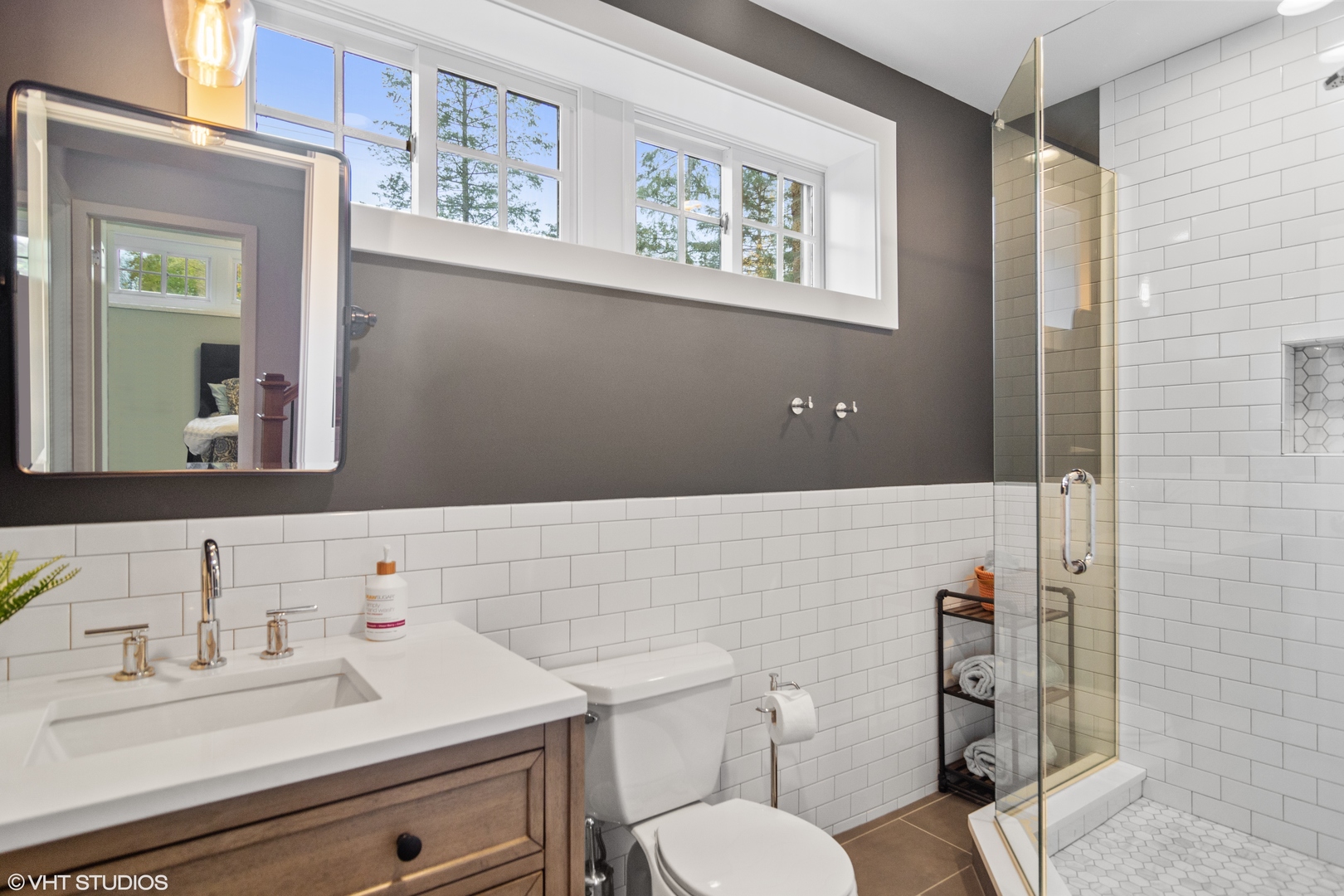 1601 Banbury Road Inverness, IL 60067 - Photo 30 of 36 a bathroom with a sink mirror vanity and toilet