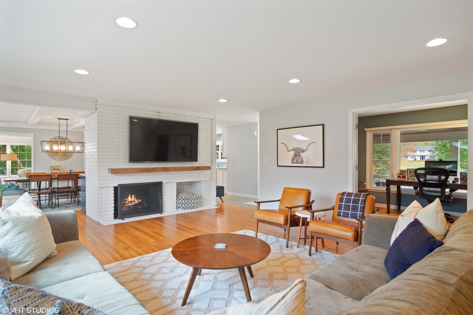 1601 Banbury Road Inverness, IL 60067 - Photo 5 of 36 a living room with fireplace furniture and a flat screen tv