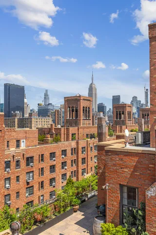 a view of a building with a garden