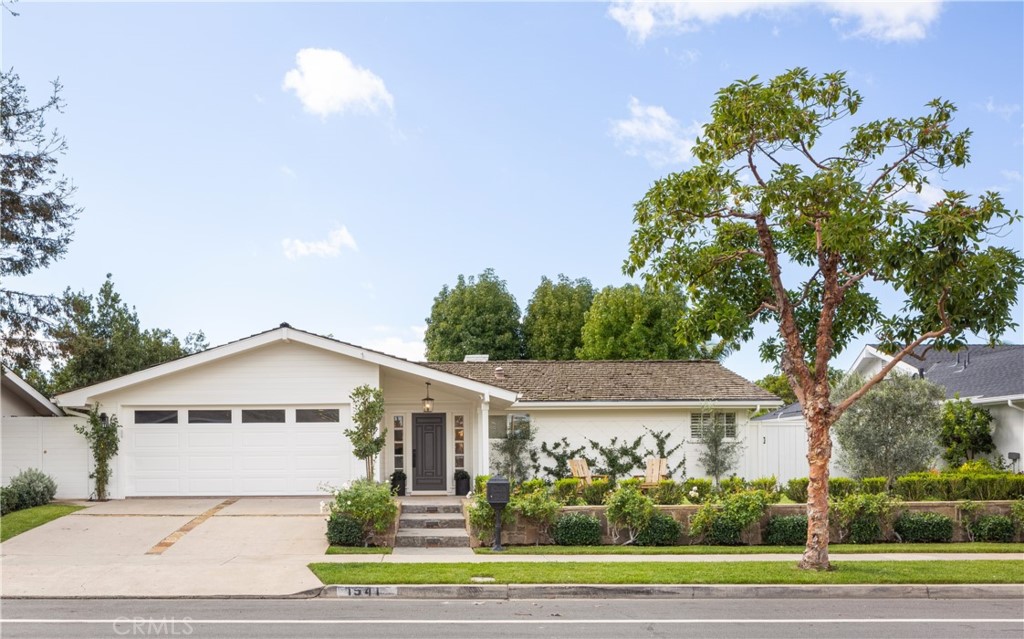 1941 Commodore Road Newport Beach, CA 92660 - Photo 1 of 35 a view of a house with a yard and plants