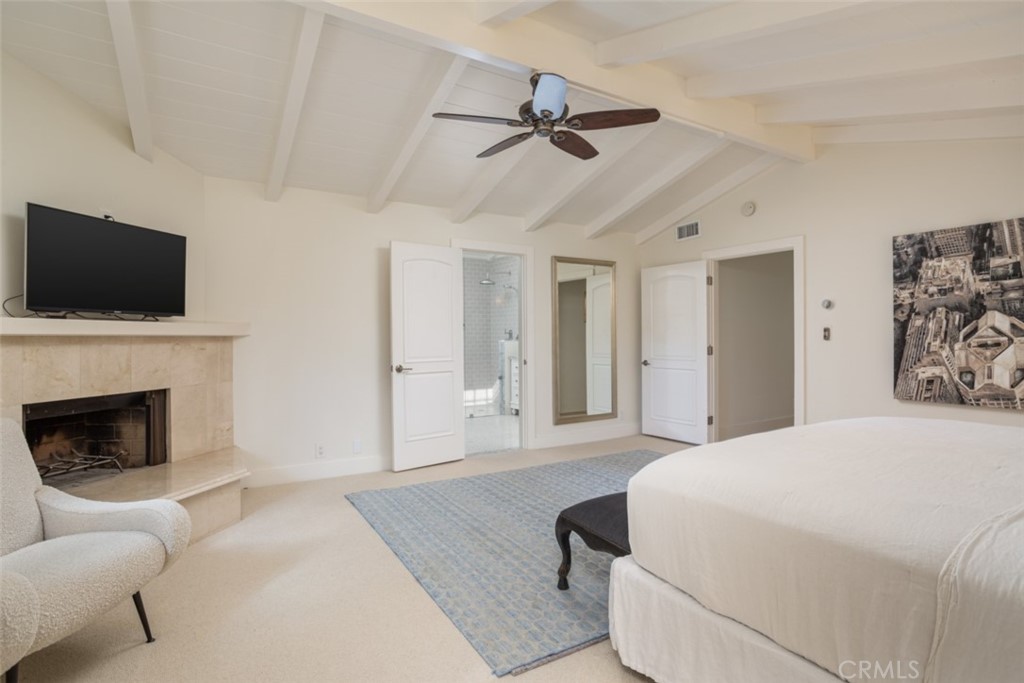 1941 Commodore Road Newport Beach, CA 92660 - Photo 16 of 35 a bedroom with a bed and a flat screen tv