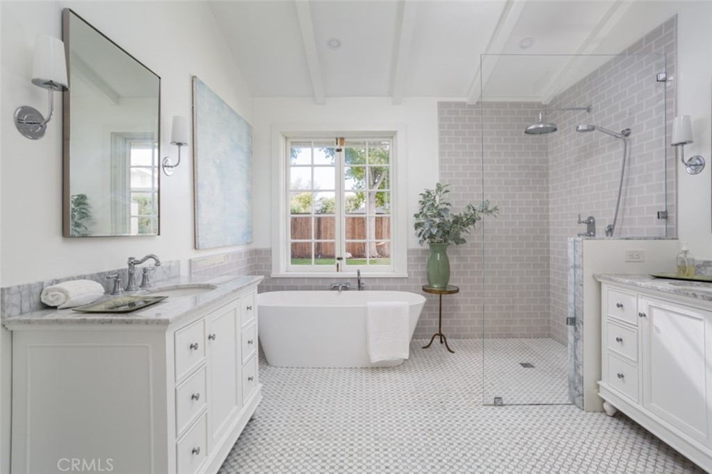 1941 Commodore Road Newport Beach, CA 92660 - Photo 17 of 35 a spacious bathroom with a granite countertop sink a toilet a large mirror and shower