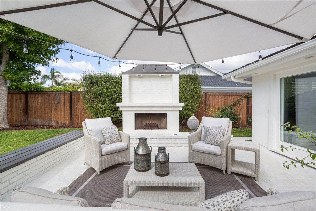 1941 Commodore Road Newport Beach, CA 92660 - Photo 25 of 35 a living room with furniture and a fireplace