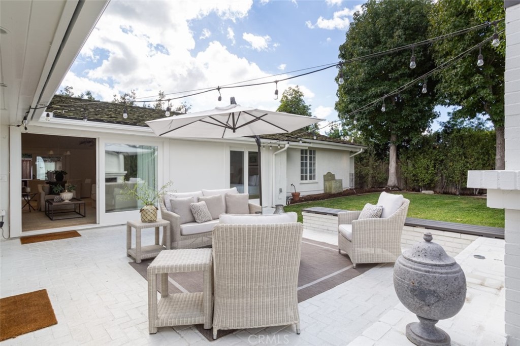 1941 Commodore Road Newport Beach, CA 92660 - Photo 27 of 35 a view of a patio with couches table and chairs and potted plants