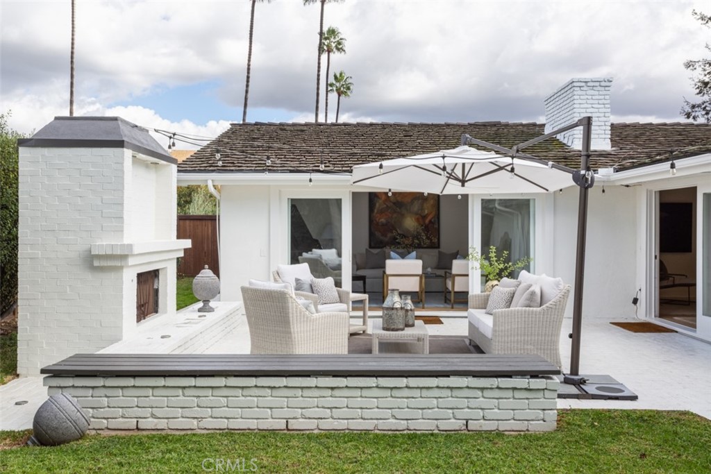 1941 Commodore Road Newport Beach, CA 92660 - Photo 28 of 35 a view of the patio with couches chairs and a fire pit