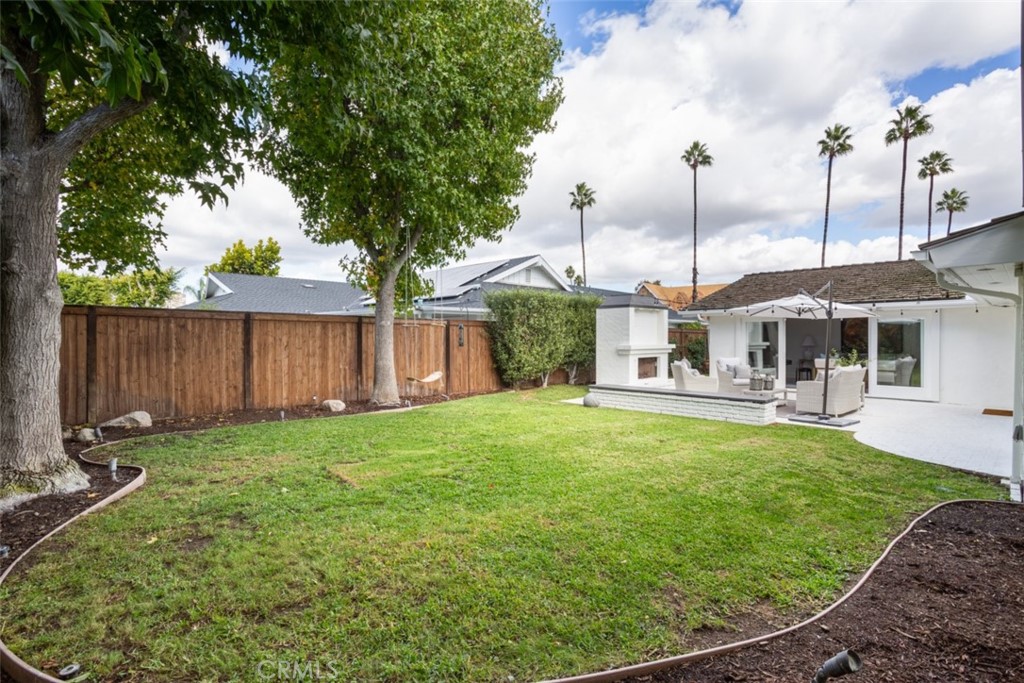 1941 Commodore Road Newport Beach, CA 92660 - Photo 29 of 35 a front view of a house with garden