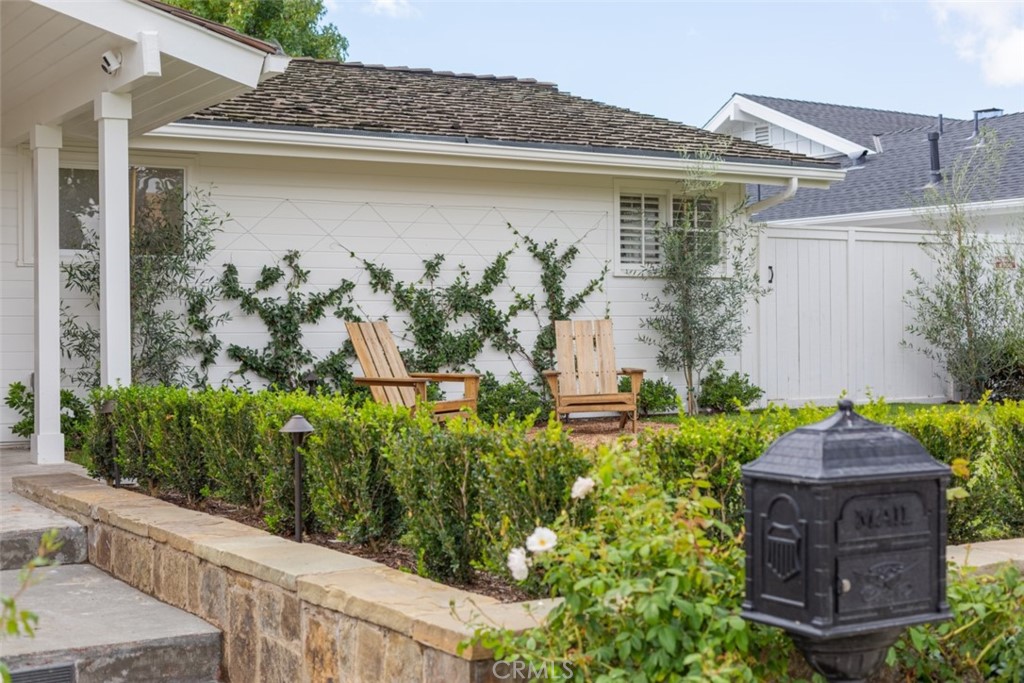 1941 Commodore Road Newport Beach, CA 92660 - Photo 3 of 35 a front view of a house with garden