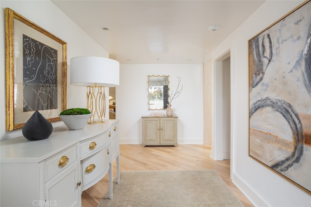 1941 Commodore Road Newport Beach, CA 92660 - Photo 4 of 35 a bedroom with a bed and a dresser