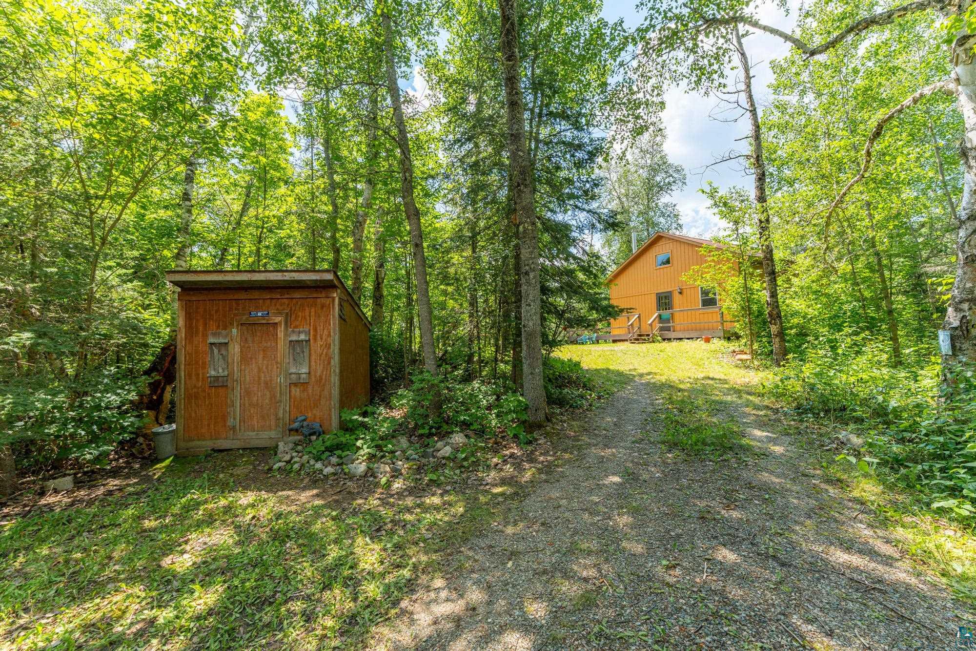 296 Shady Lane Ely, MN 55731 - Photo 2 of 27 View of yard with a shed