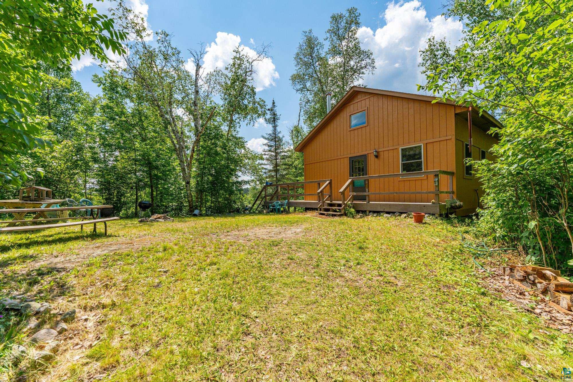 296 Shady Lane Ely, MN 55731 - Photo 3 of 27 View of yard with a deck