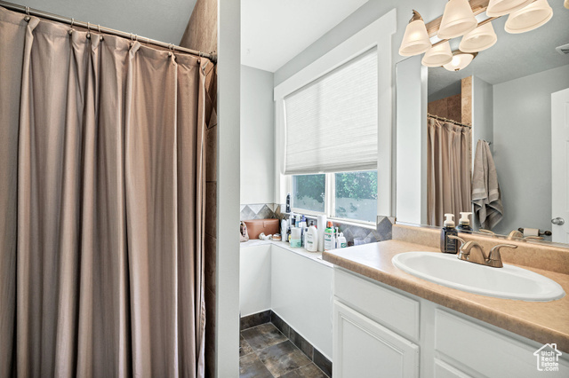 2280 South 450 West Perry, UT 84302 - Photo 13 of 38 Full bath featuring vanity and a shower with curtain