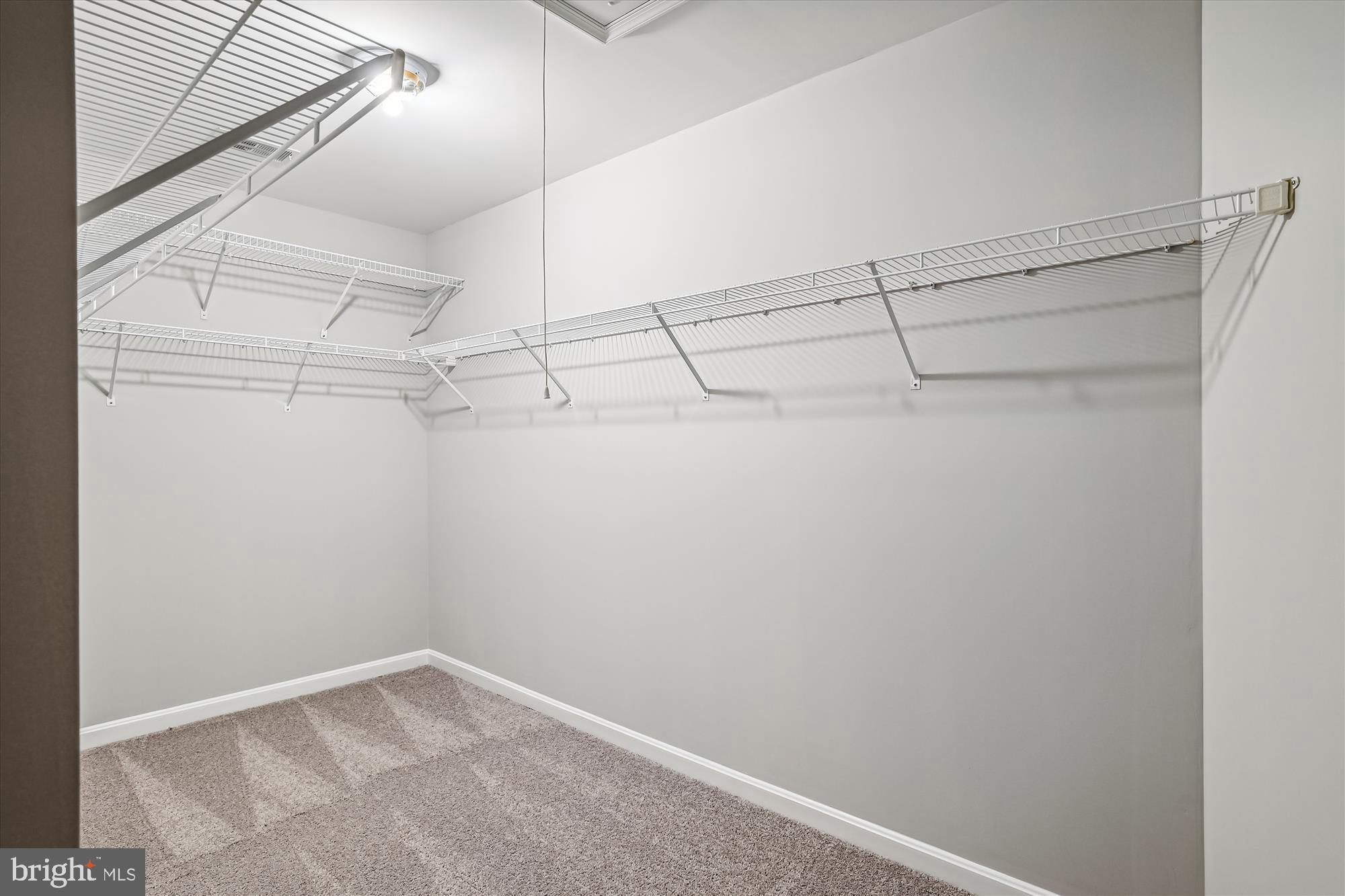 5958 Florey Road Hanover, MD 21076 - Photo 64 of 77 a view of a room with racks on the wall